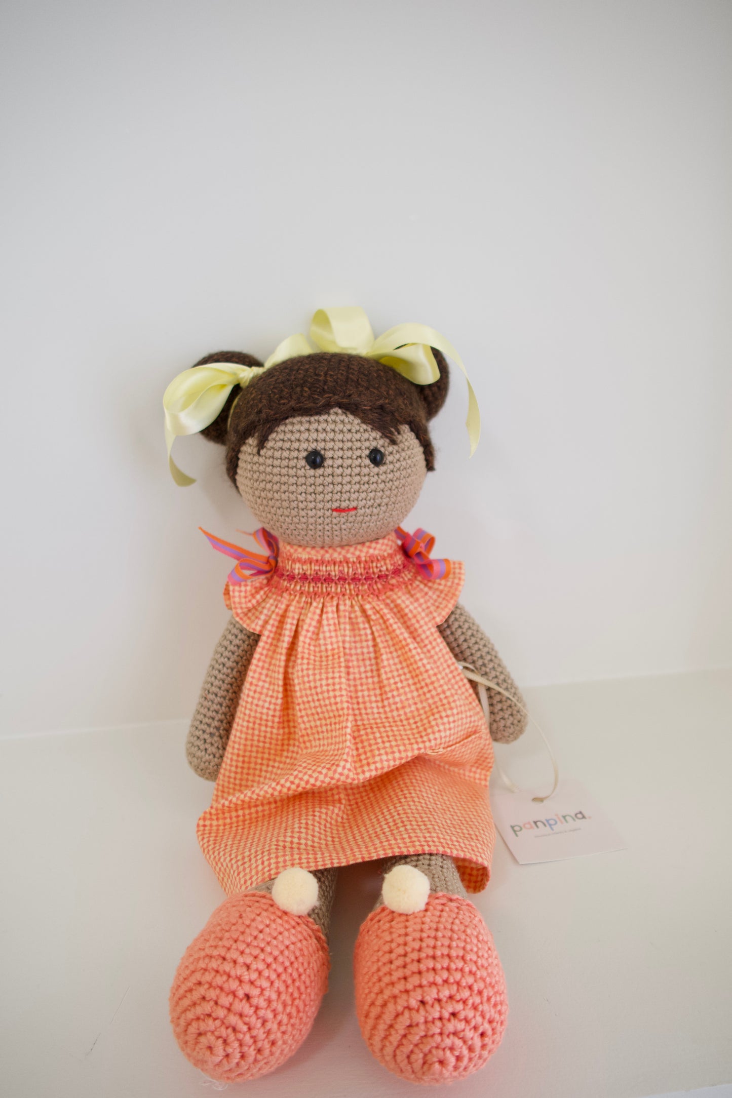 Muñequita tejida - vestido naranja