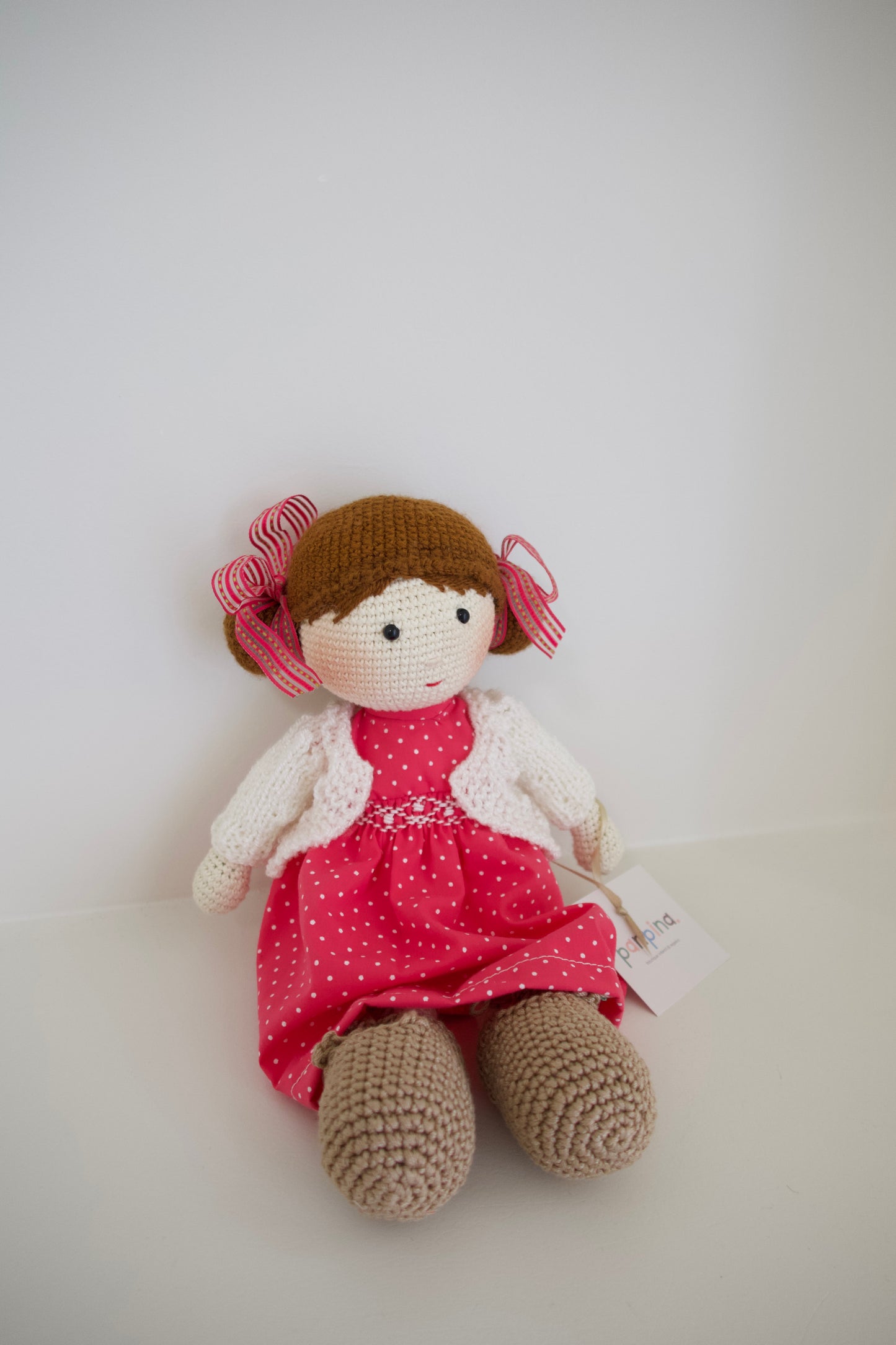 Muñequita tejida - vestido rosa puntos